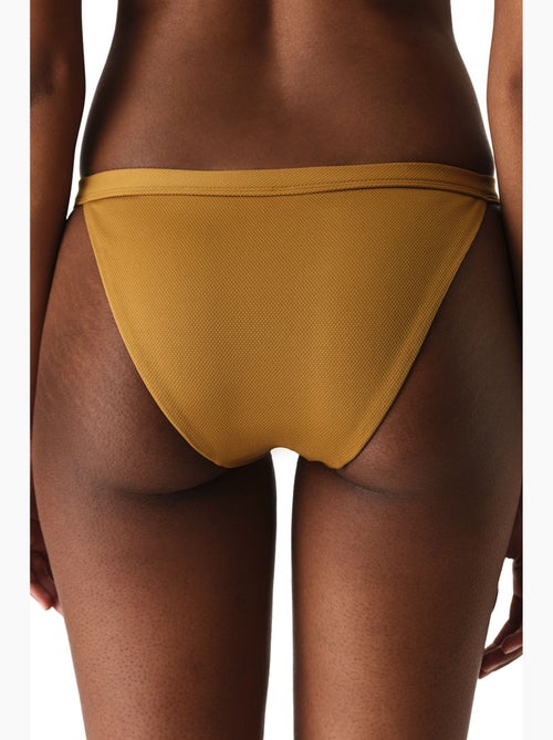 Montana bikinibroekje met structuur aan de zijkant en middelhoge taille penti - Kiabi Montana bikinibroekje met structuur aan de zijkant en middelhoge taille penti - Kiabi