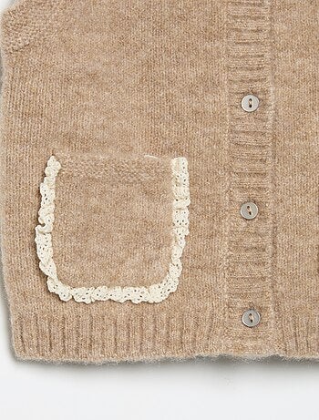 Mouwloos gilet met geborduurde zakken