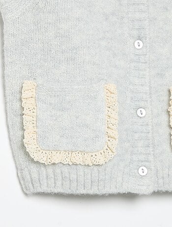 Mouwloos gilet met geborduurde zakken