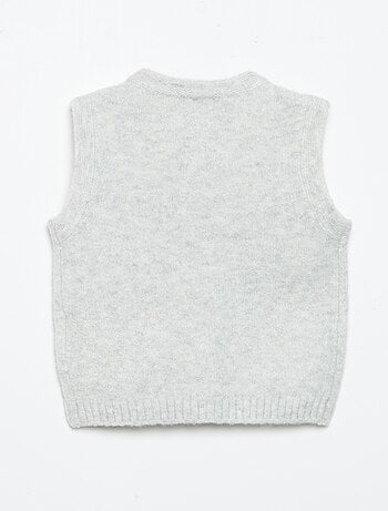 Mouwloos gilet met geborduurde zakken