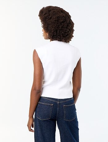 Mouwloos gilet met goudkleurige knopen
