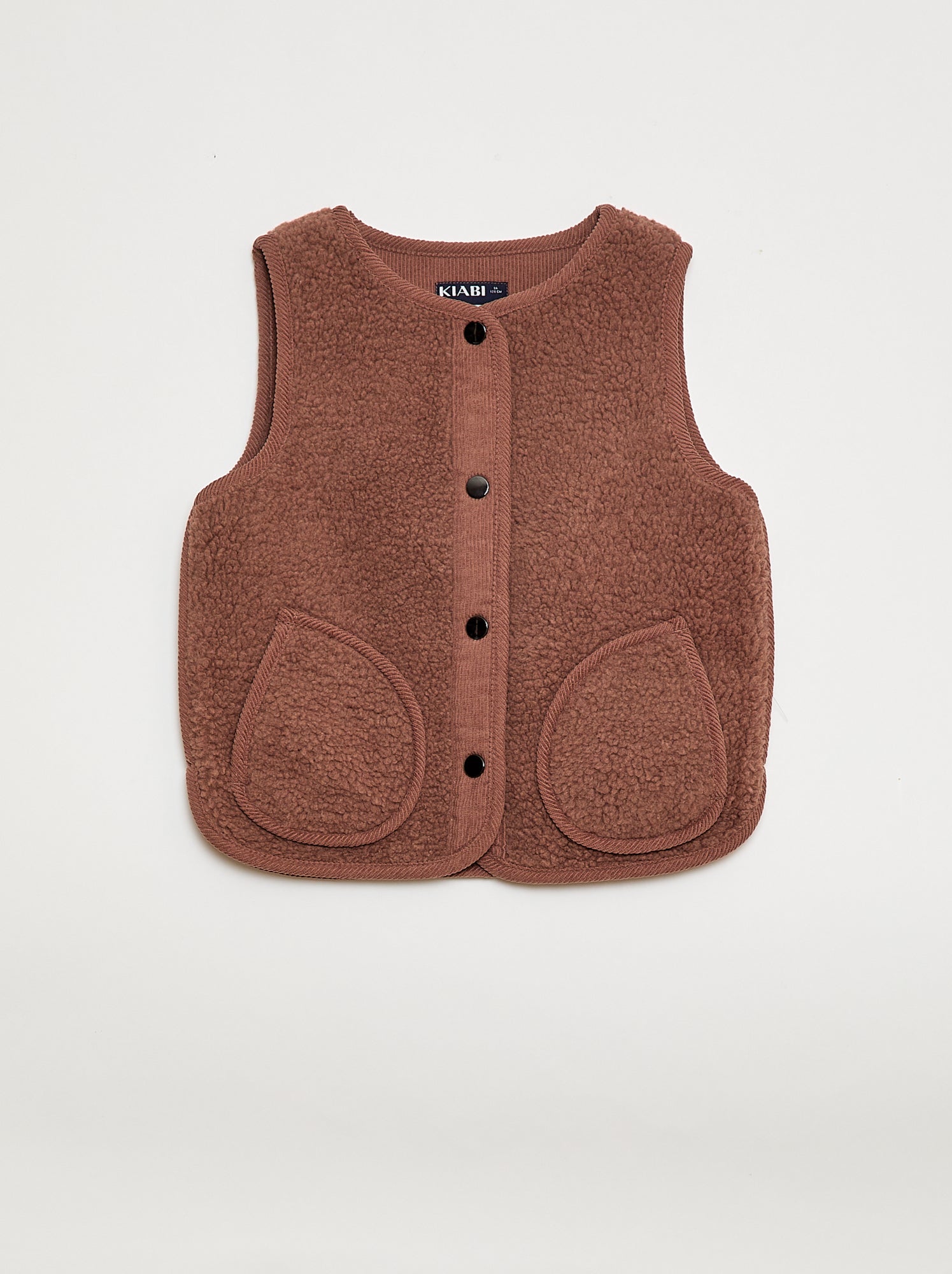 Mouwloos jasje van imitatieschapenvacht