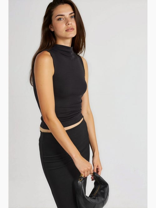 Mouwloos top ribtricot hoge hals aansluitend busem - Kiabi Mouwloos top ribtricot hoge hals aansluitend busem - Kiabi