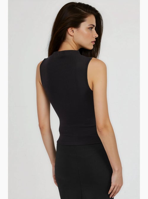 Mouwloos top ribtricot hoge hals aansluitend busem - Kiabi Mouwloos top ribtricot hoge hals aansluitend busem - Kiabi