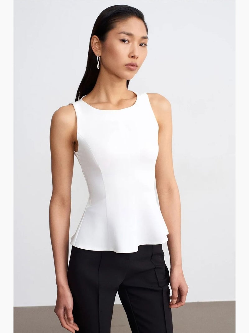 Mouwloos top van crêpe met peplum dilvin Wit - Kiabi