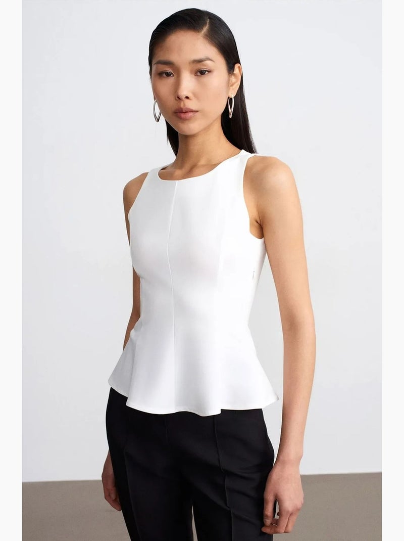Mouwloos top van crêpe met peplum dilvin Wit - Kiabi