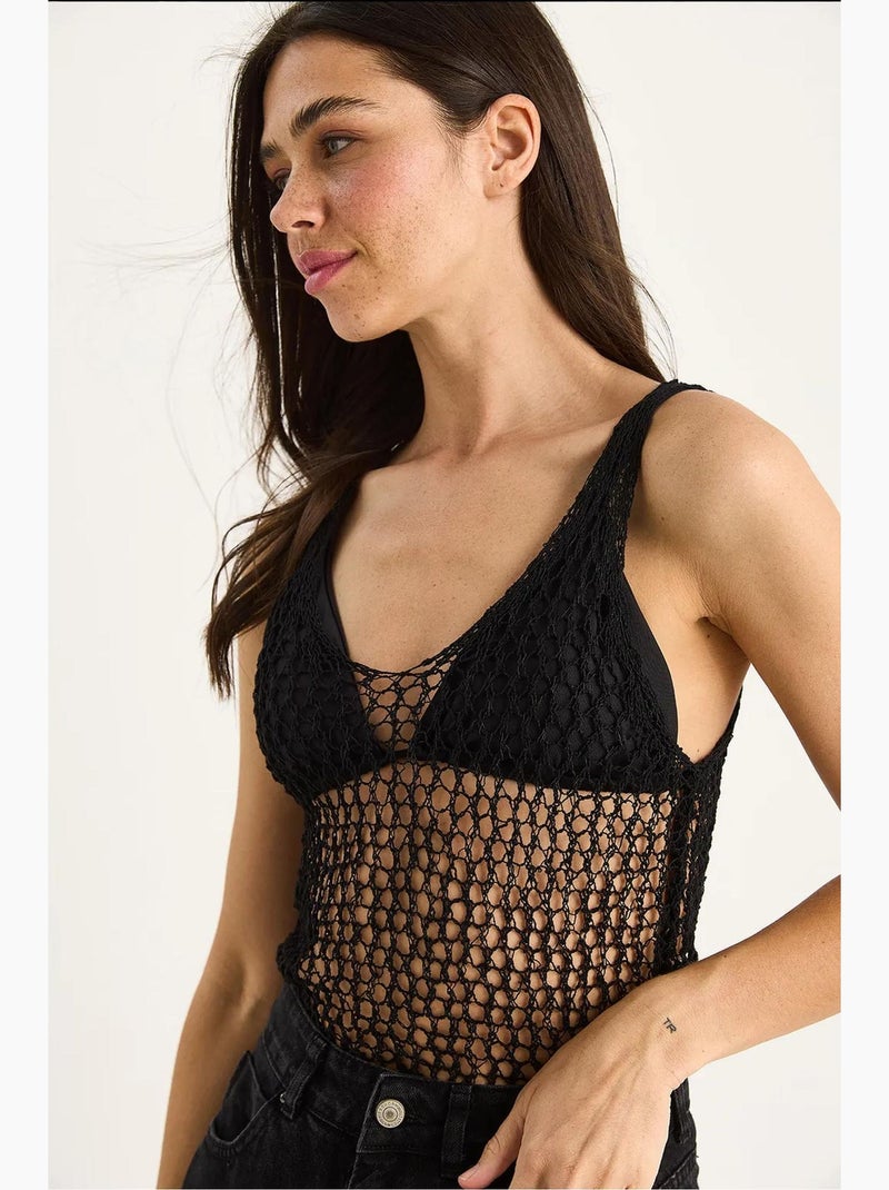 Mouwloos top van textuurtricot ronde hals met meshdetail lucci Zwart - Kiabi