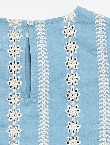 Mouwloze blouse met all-over geborduurde motieven