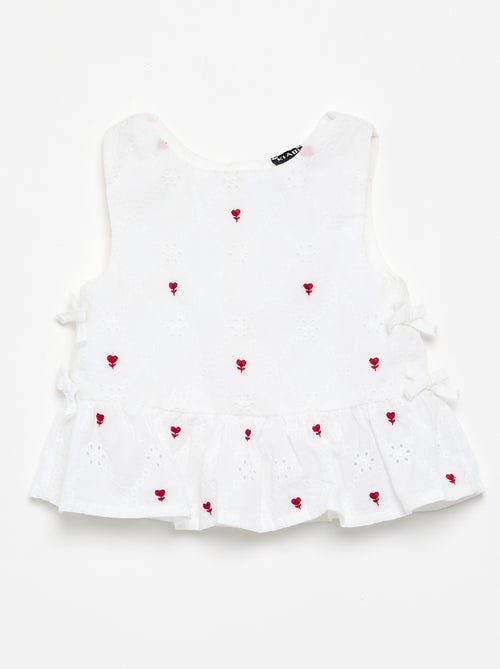 Mouwloze blouse met borduursels - Kiabi Mouwloze blouse met borduursels - Kiabi