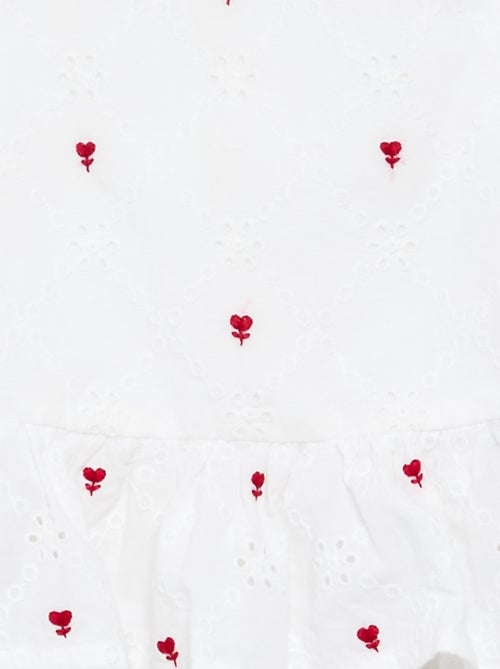Mouwloze blouse met borduursels - Kiabi Mouwloze blouse met borduursels - Kiabi