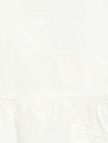 Mouwloze blouse met geborduurde bloemen