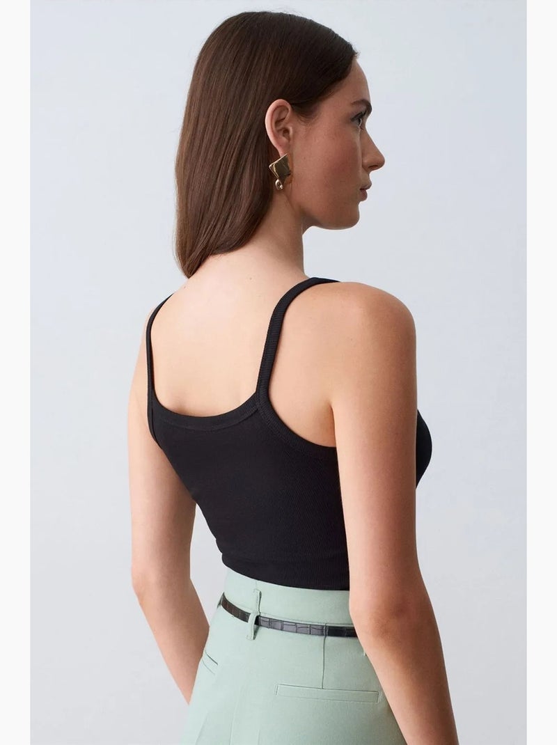 Mouwloze blouse met halternek en ribstructuur dilvin Zwart - Kiabi