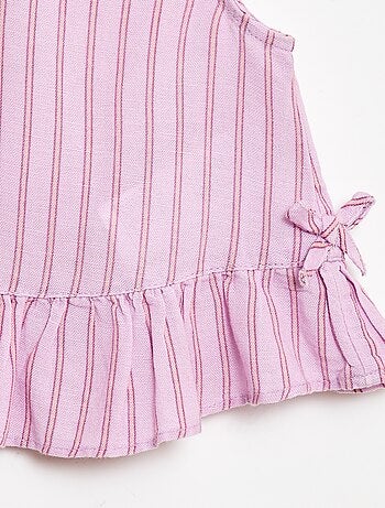 Mouwloze blouse met ruches en strikken