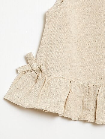 Mouwloze blouse met ruches en strikken