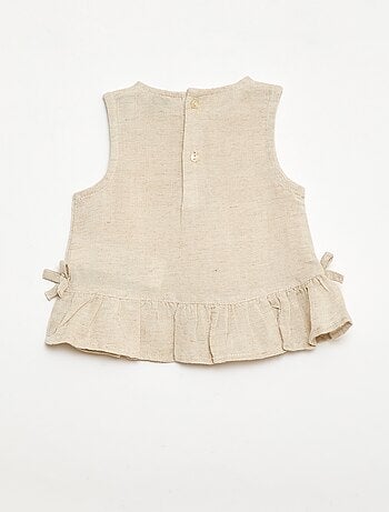 Mouwloze blouse met ruches en strikken
