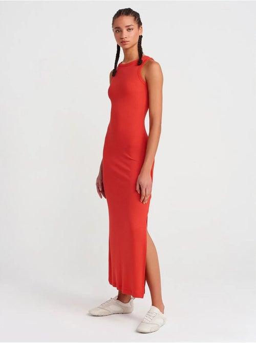 Mouwloze bodycon midi-jurk met split dilvin - Kiabi Mouwloze bodycon midi-jurk met split dilvin - Kiabi