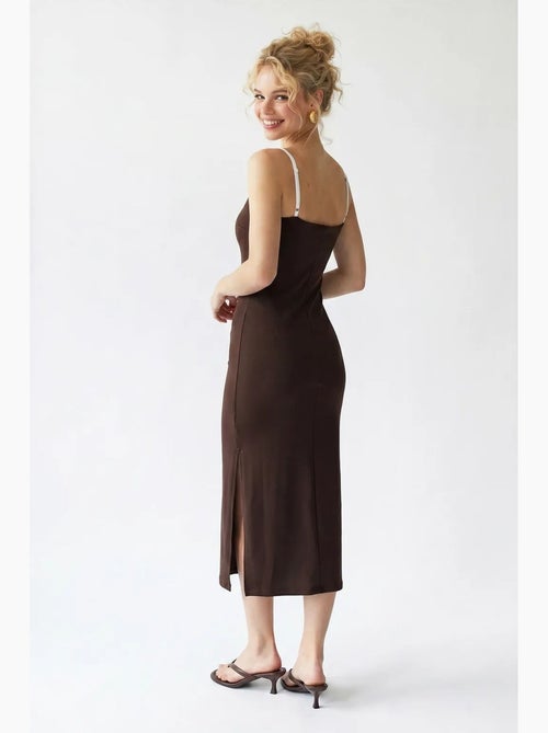 Mouwloze bodycon midi-jurk met split mixray - Kiabi Mouwloze bodycon midi-jurk met split mixray - Kiabi