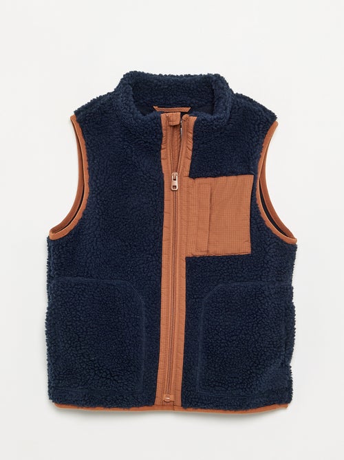Mouwloze bodywarmer met schapenvachteffect - Kiabi Mouwloze bodywarmer met schapenvachteffect - Kiabi