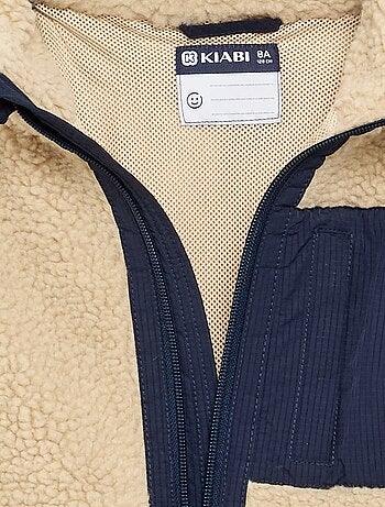 Mouwloze bodywarmer met schapenvachteffect