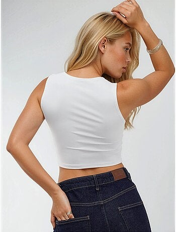 Mouwloze gebreide blouse met boothals busem