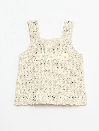 Mouwloze gehaakte trui met bloemdetails