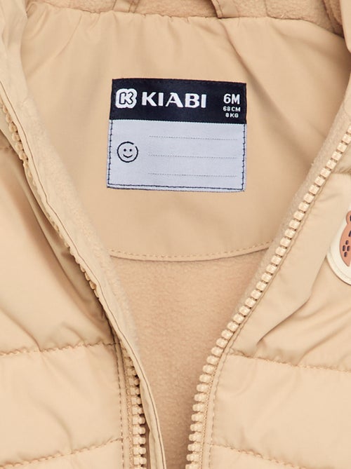 Mouwloze gewatteerde jas met capuchon - Kiabi Mouwloze gewatteerde jas met capuchon - Kiabi