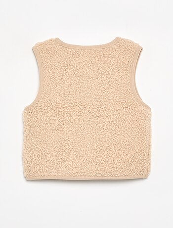 Mouwloze jas met schapenvachteffect