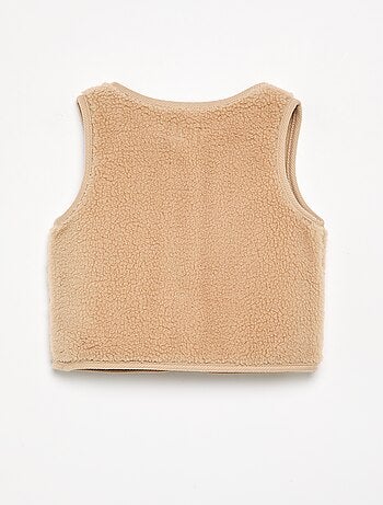 Mouwloze jas met schapenvachteffect