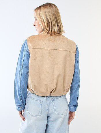 Mouwloze jas van suèdine