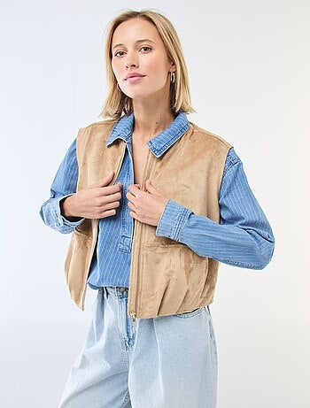 Mouwloze jas van suèdine