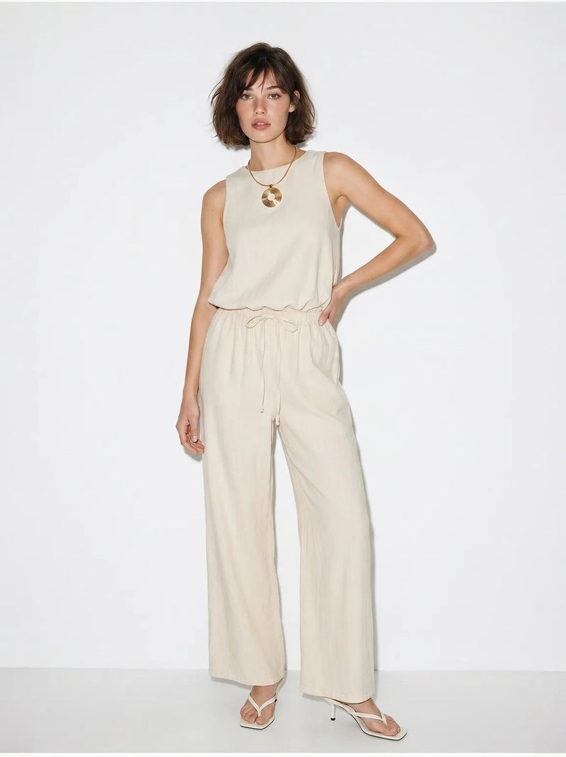 Mouwloze jumpsuit van katoen met wijde pijpen lucci Klei-beige - Kiabi