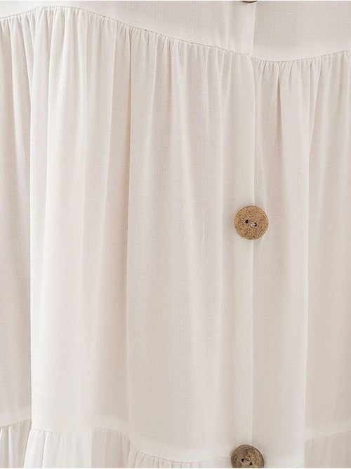 Mouwloze korte jurk met knopen bdart - Kiabi Mouwloze korte jurk met knopen bdart - Kiabi