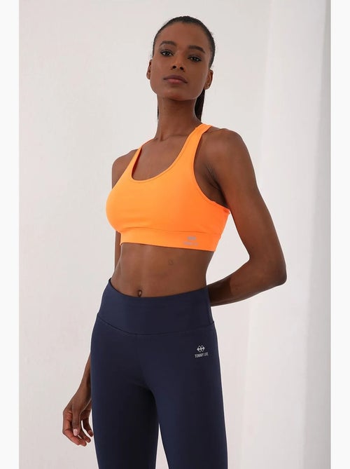 Mouwloze, korte, nauwsluitende sporttop tommy - Kiabi