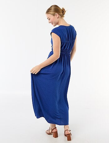 Mouwloze lange jurk met knoop