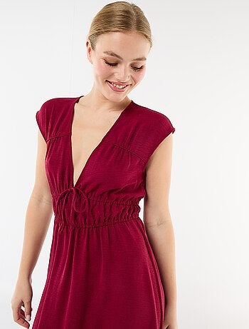 Mouwloze lange jurk met knoop