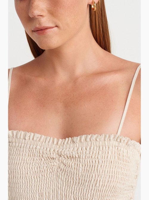 Mouwloze midi-jurk met a-lijn en bandeau dilvin - Kiabi Mouwloze midi-jurk met a-lijn en bandeau dilvin - Kiabi