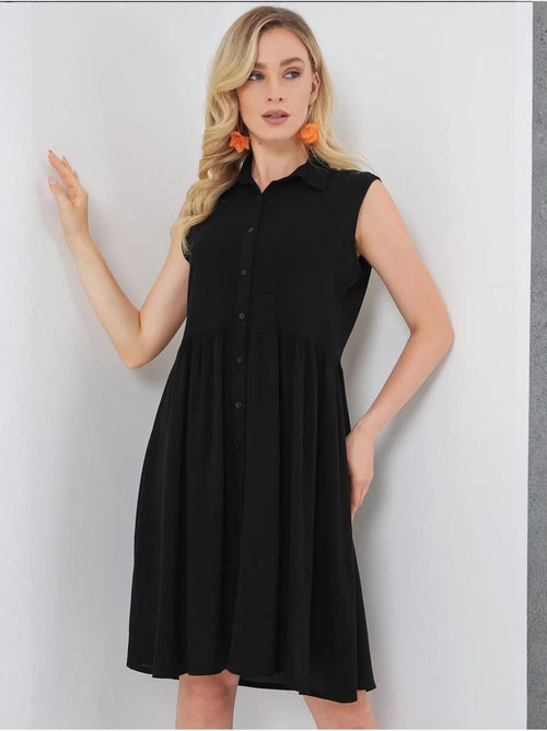 Mouwloze midi-jurk met knopen en overhemdkraag bdart - Kiabi Mouwloze midi-jurk met knopen en overhemdkraag bdart - Kiabi