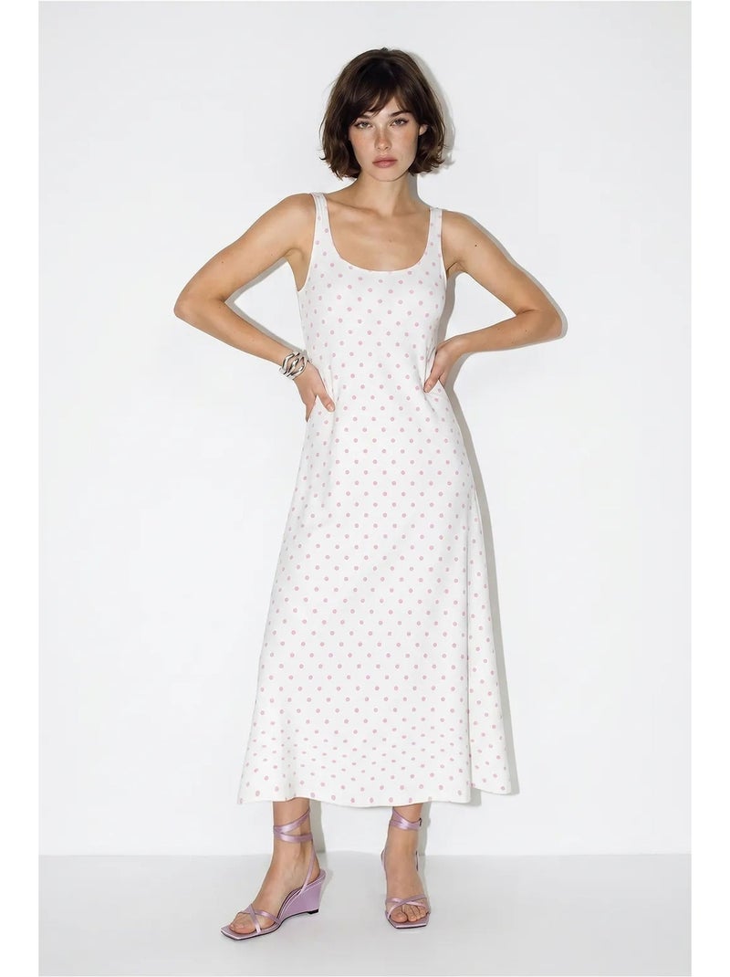 Mouwloze midi-jurk met stippen en strikdetail lucci Wit - Kiabi