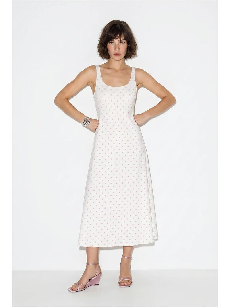 Mouwloze midi-jurk met stippen en strikdetail lucci Wit - Kiabi