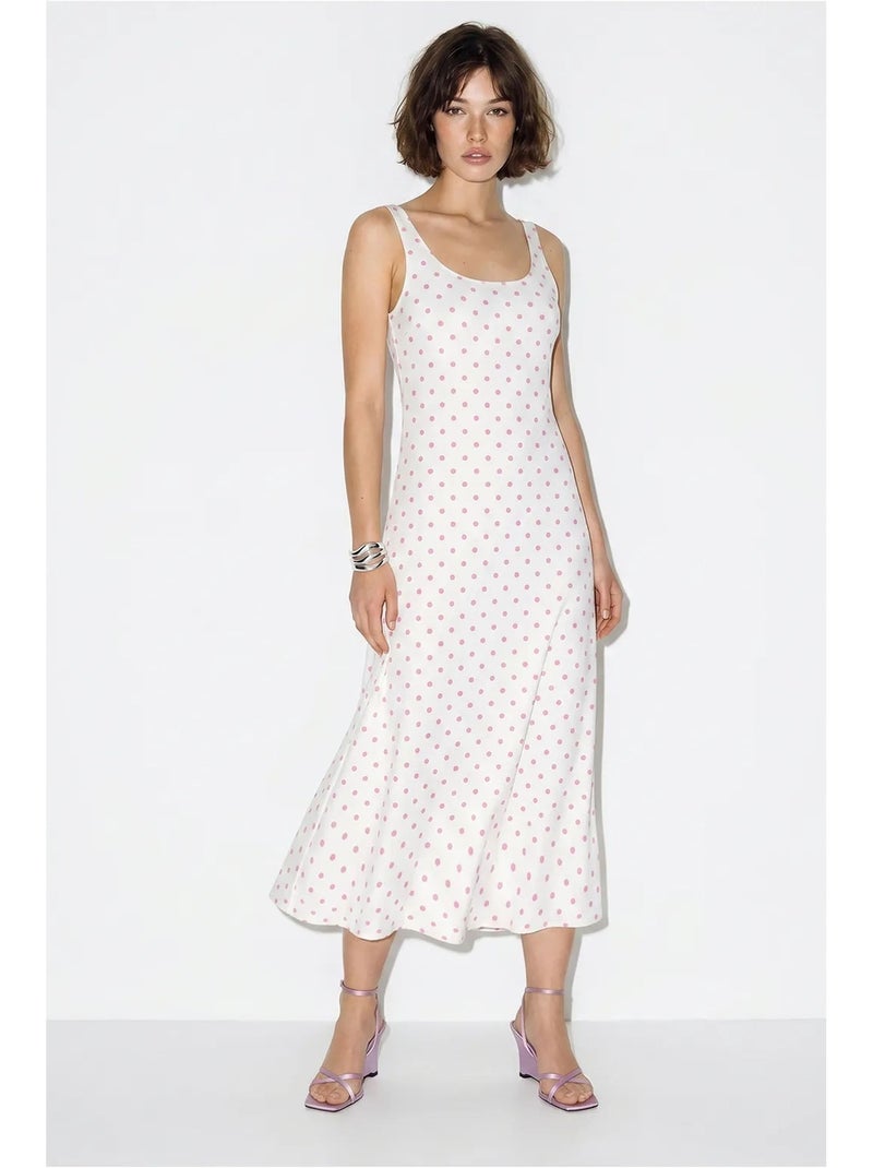 Mouwloze midi-jurk met stippen en strikdetail lucci Wit - Kiabi