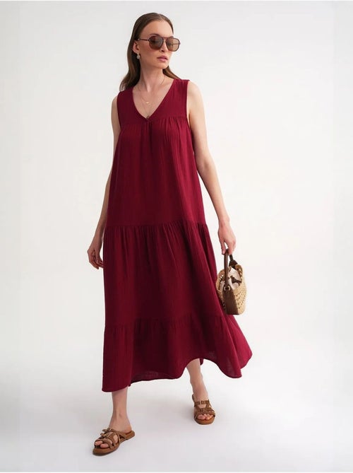 Mouwloze midi-jurk van mousseline met v-hals en zakken mixray - Kiabi Mouwloze midi-jurk van mousseline met v-hals en zakken mixray - Kiabi