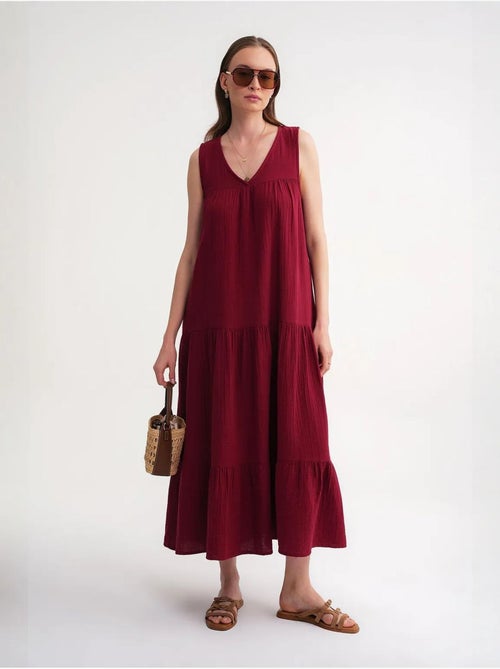 Mouwloze midi-jurk van mousseline met v-hals en zakken mixray - Kiabi Mouwloze midi-jurk van mousseline met v-hals en zakken mixray - Kiabi