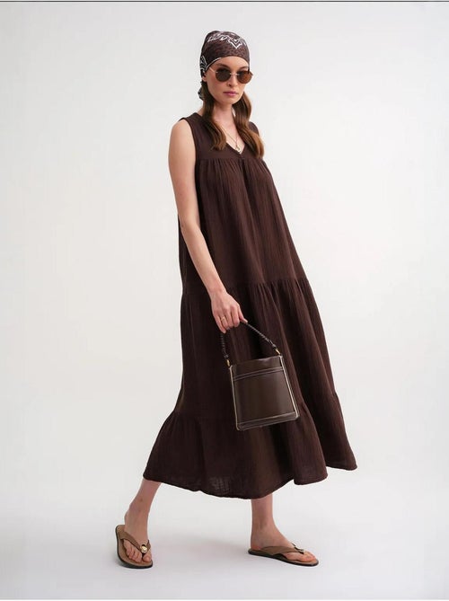 Mouwloze midi-jurk van mousseline met v-hals en zakken mixray - Kiabi Mouwloze midi-jurk van mousseline met v-hals en zakken mixray - Kiabi