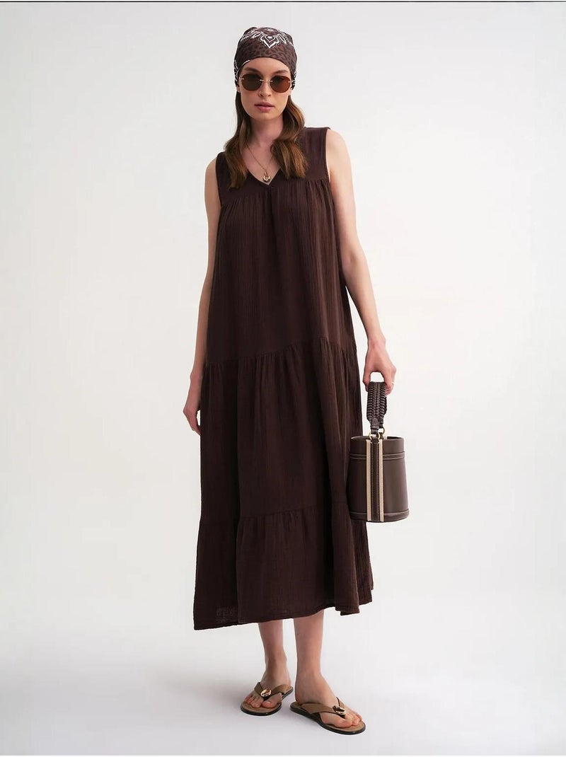 Mouwloze midi-jurk van mousseline met v-hals en zakken mixray Donkerbruin - Kiabi