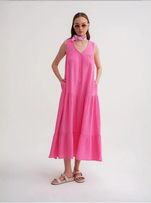 Mouwloze midi-jurk van mousseline met v-hals en zakken mixray - Kiabi Mouwloze midi-jurk van mousseline met v-hals en zakken mixray - Kiabi