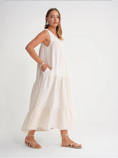 Mouwloze midi-jurk van mousseline met v-hals en zakken mixray - Kiabi Mouwloze midi-jurk van mousseline met v-hals en zakken mixray - Kiabi