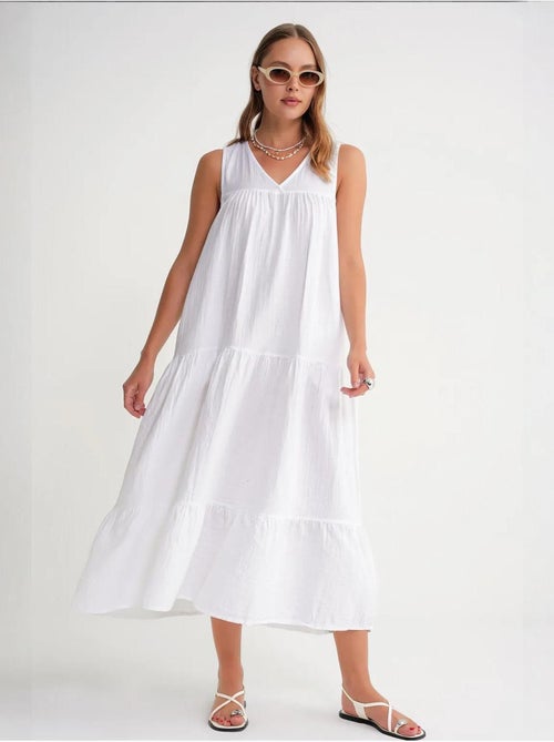 Mouwloze midi-jurk van mousseline met v-hals en zakken mixray - Kiabi Mouwloze midi-jurk van mousseline met v-hals en zakken mixray - Kiabi