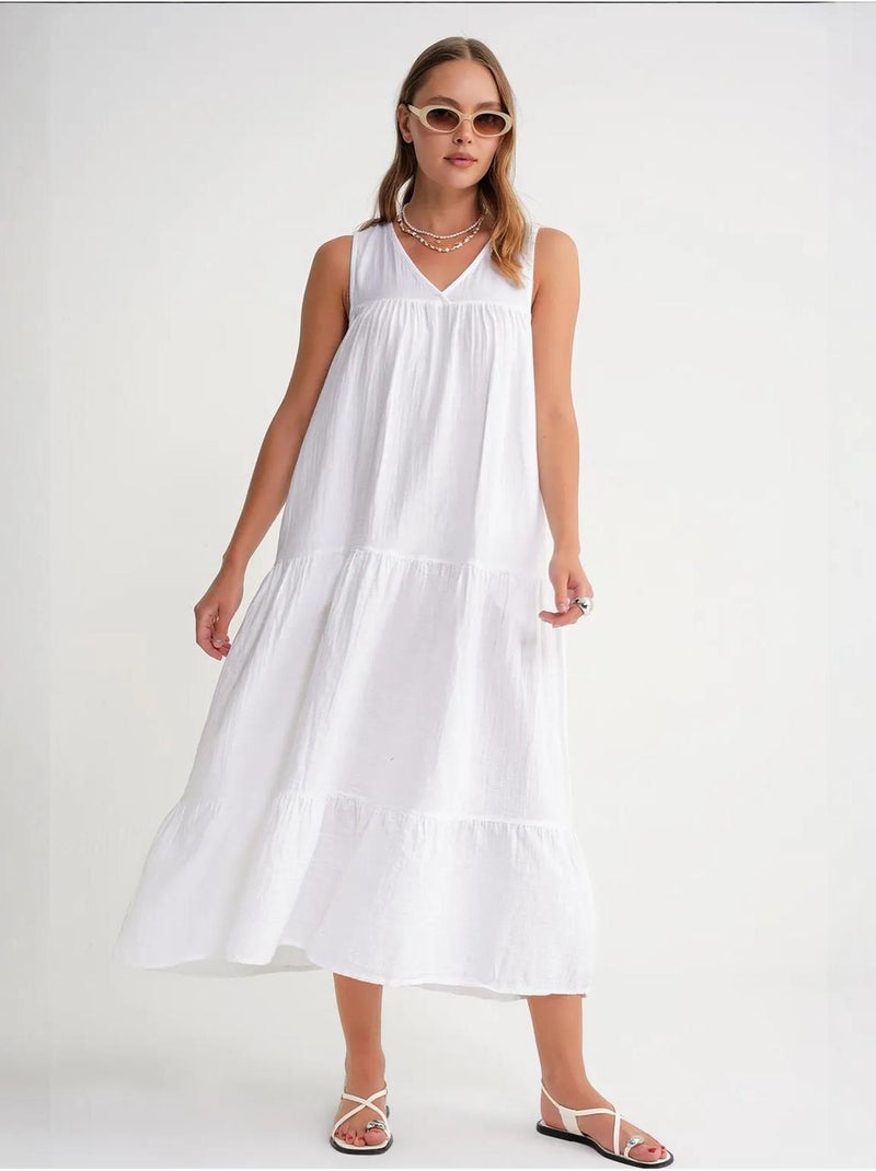 Mouwloze midi-jurk van mousseline met v-hals en zakken mixray Wit - Kiabi