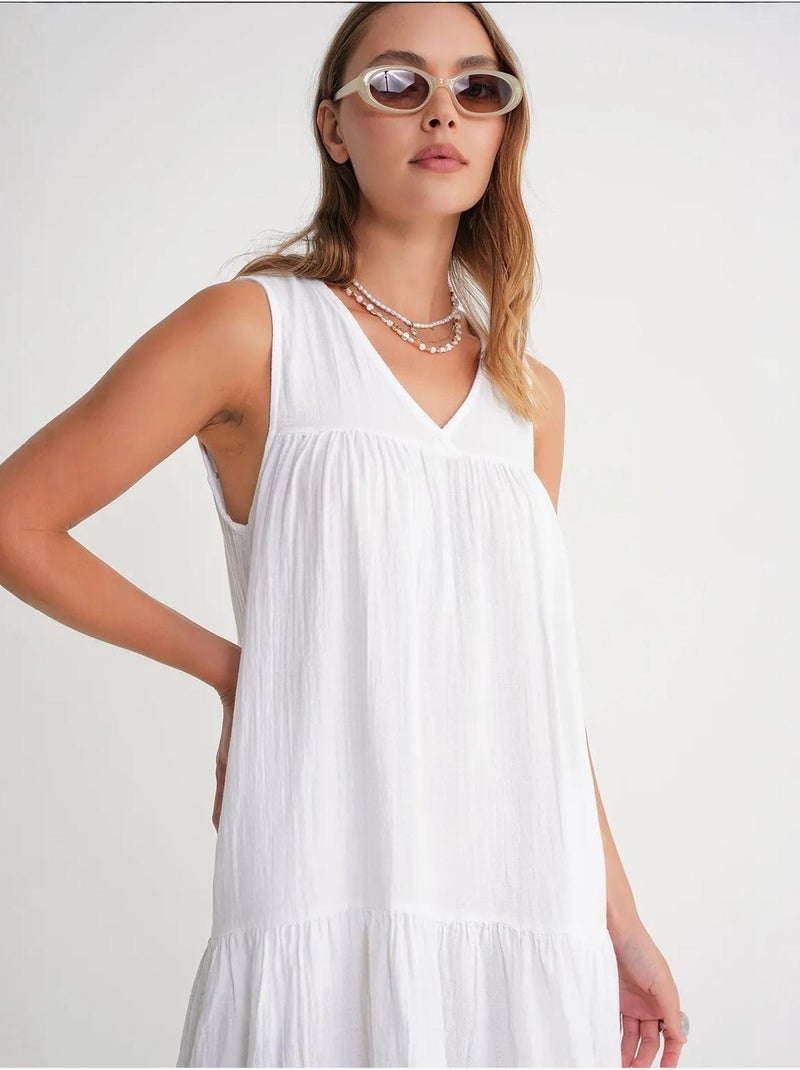Mouwloze midi-jurk van mousseline met v-hals en zakken mixray Wit - Kiabi