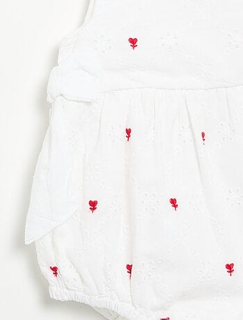 Mouwloze romper met borduursels